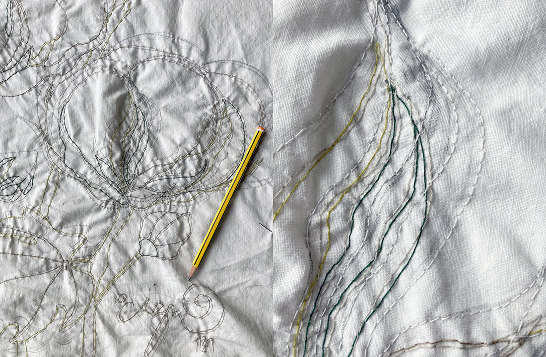 Foglie e boccioli ricamati a mano su tessuto vintage di lino