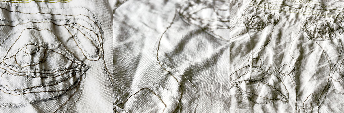 Dettaglio del volto ricamato con fili naturali